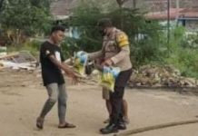 read news – Pemberian Bantuan Beras untuk Warga tak Mampu di Simpang Lampu Merah di Windsor