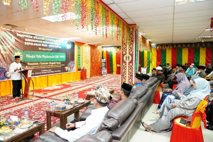 Setdako Batam, Jefridin saat menyampaikan sambutan di acara Maulid Nabi Besar Muhammad SAW, Sabtu (15/10/2022) yang digelar warga perkumpulan Bubuhan Banjar Kepri dan Kota Batam. (Foto : muhammad amin - batamtv.com)
