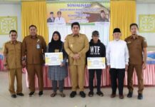 read news – Pemkab Awasi Penyaluran Dana Swadaya RTLH di Bintan Bupati Bintan Roby Kurniawan (tengah) saat acara Sosialisasi BS RTLH, Selasa (23/5/2023) di Gedung Nasional Tanjung Uban. (Foto : abdi perdana - batamtv.com)