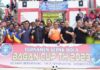 read news – Turnamen Sepak Bola Bagan Cup 2023 Mulai Digelar Setdako Batam, Jefridin (tengah, kaus orange) saat Turnamen Sepak Bola Bagan Cup Tahun 2023 digelar di Lapangan Bola Raja Muhammad Kampung Bagan, Kecamatan Sei Beduk pada Minggu (27/08/2023). (Foto : muhammad amin - batamtv.com)
